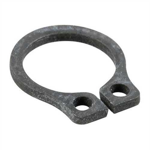 Il REMINGTON 1100/11-87 INTERCEPTOR LATCH RETAINER è un ricambio più spesso che riduce il gioco nel corpo del gancio, migliorando l'alimentazione e l'operatività.