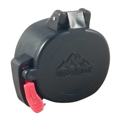 I tappi per oculari FLIP OPEN di BUTLER CREEK proteggono le lenti da polvere e umidità, aprendo facilmente con una pressione del dito, ideali per caccia e situazioni tattiche.